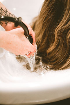 washing hair in a salon sink
