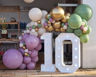 large light up number 10 with balloon garland