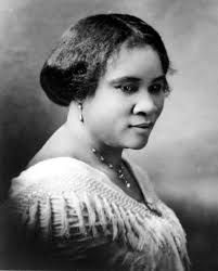 black and white photo of Madam C.J. Walker posing for the camera