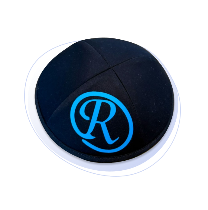A vinyl yarmulke with custom jumbo name design in blue on the front.