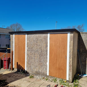 Wooden doors on a renovated garage