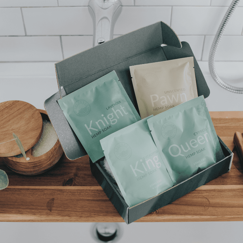 The open packaging showcasing the individual soaks in the recovery gift set.