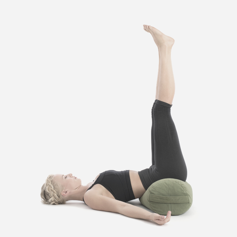 A-woman-practicing-restorative-yoga.