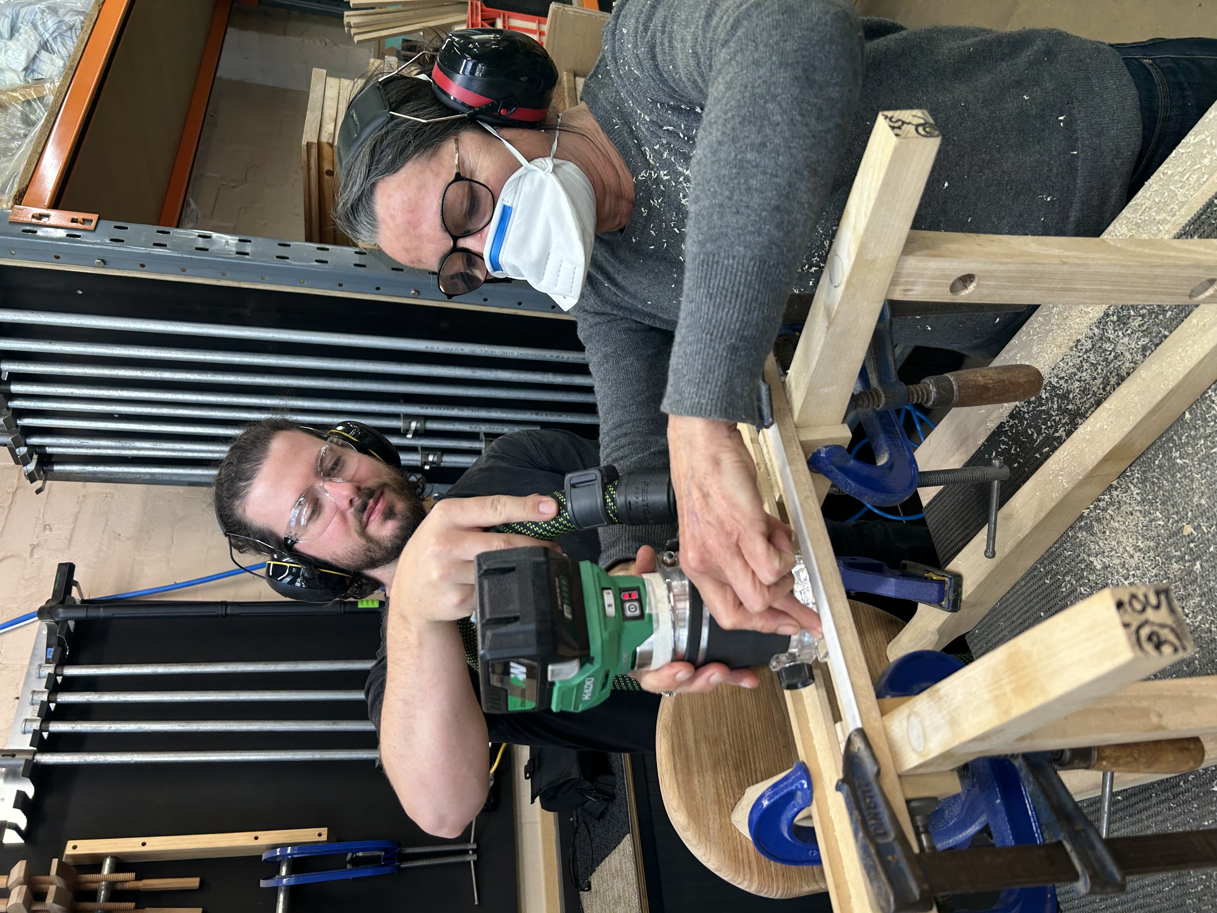 Student work on a timber stool project during a Chisel & Dowel furniture-making class.