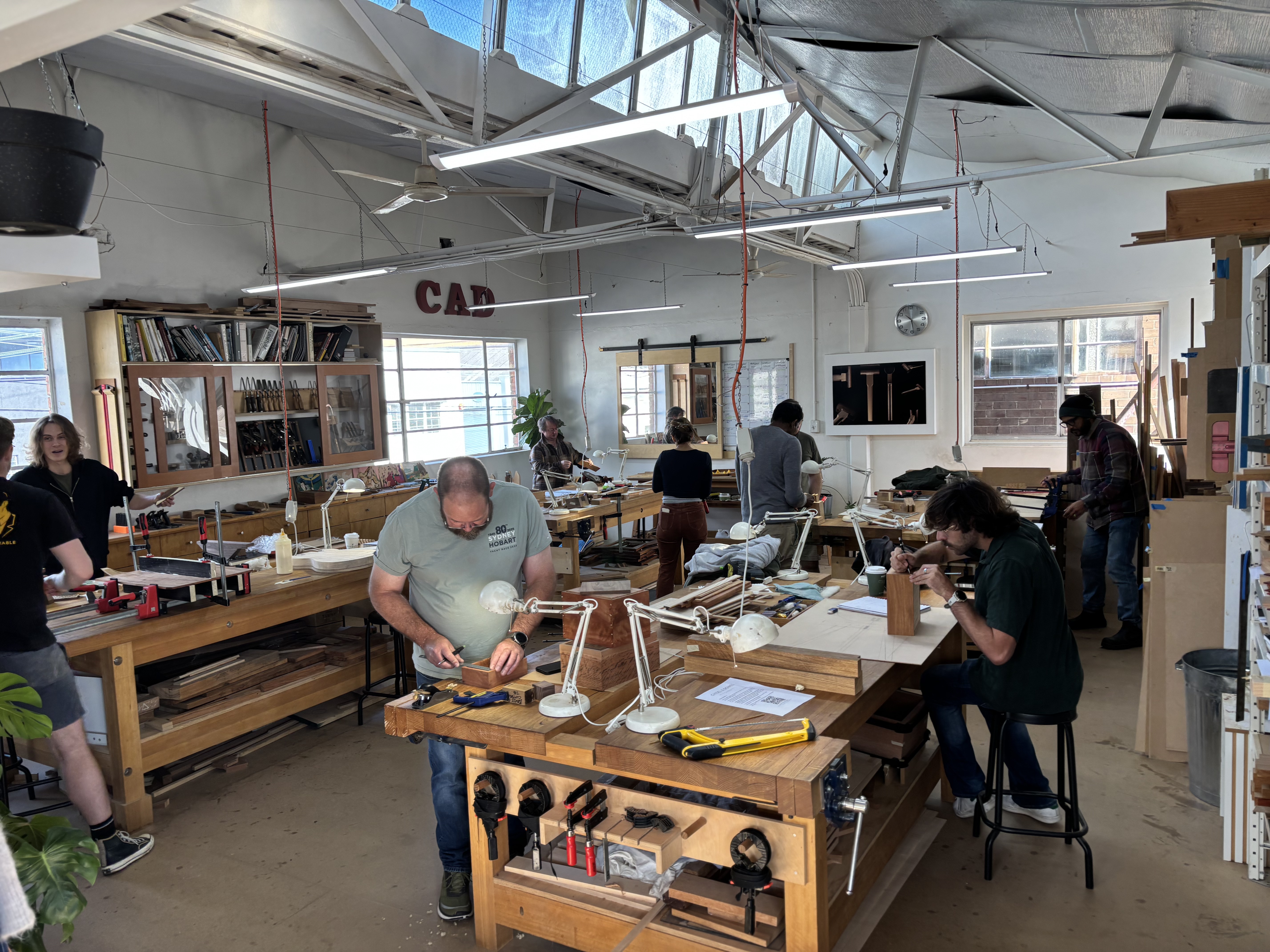 Students developing hand-tool and timber preparation skills in the Chisel & Dowel workshop.