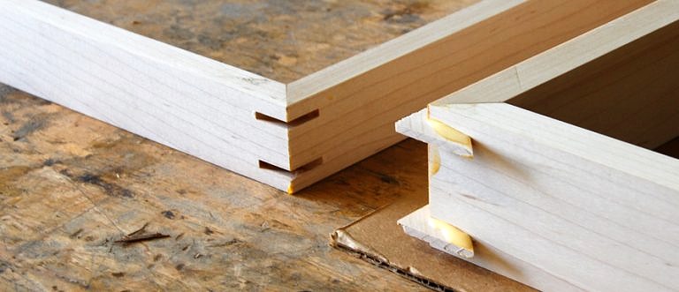 Hardwood picture-frame examples used in the Chisel & Dowel woodworking project series.