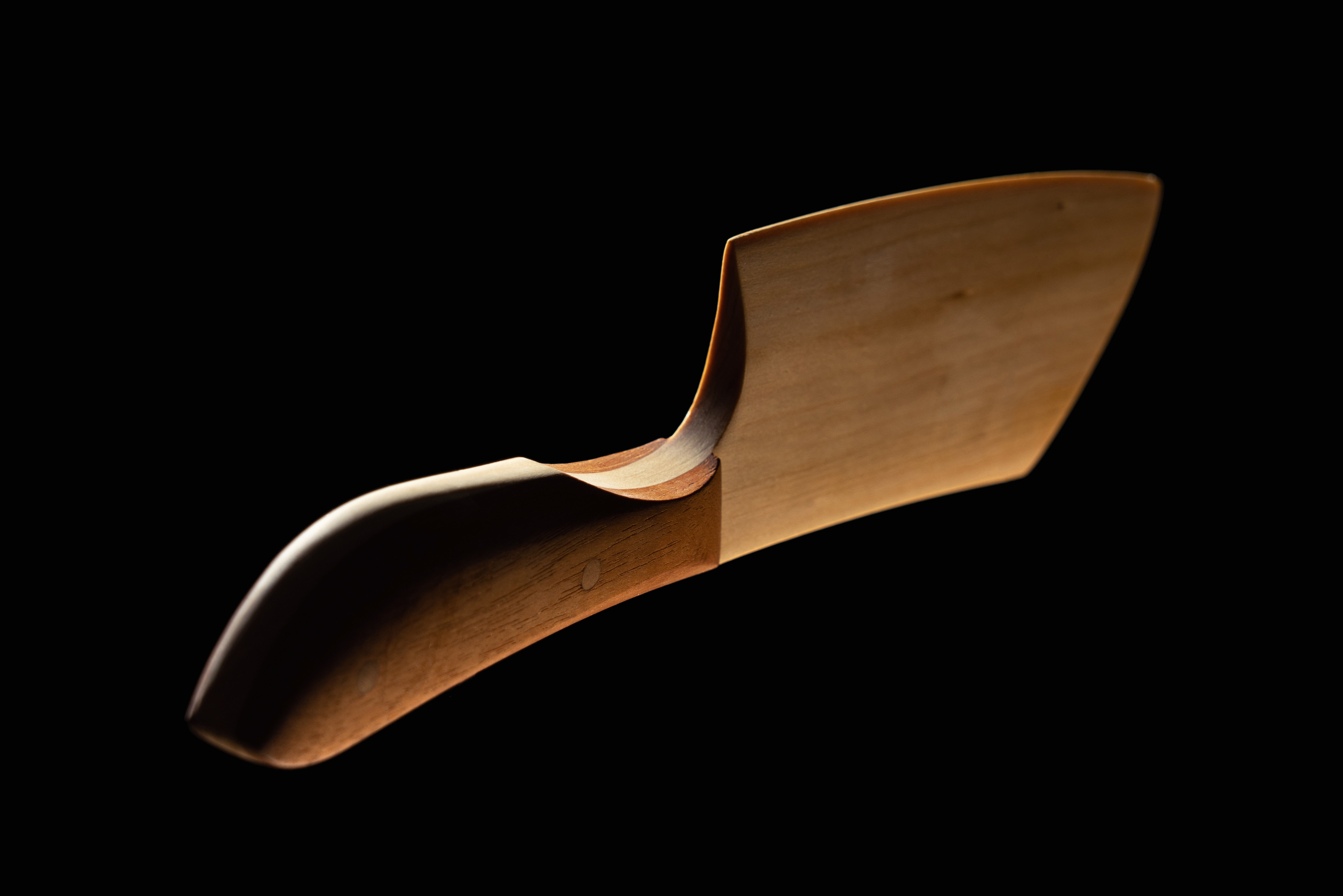 Finished shaped timber cheese knife project made by a Chisel & Dowel student.