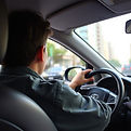 I need a picture of a teenage driving a