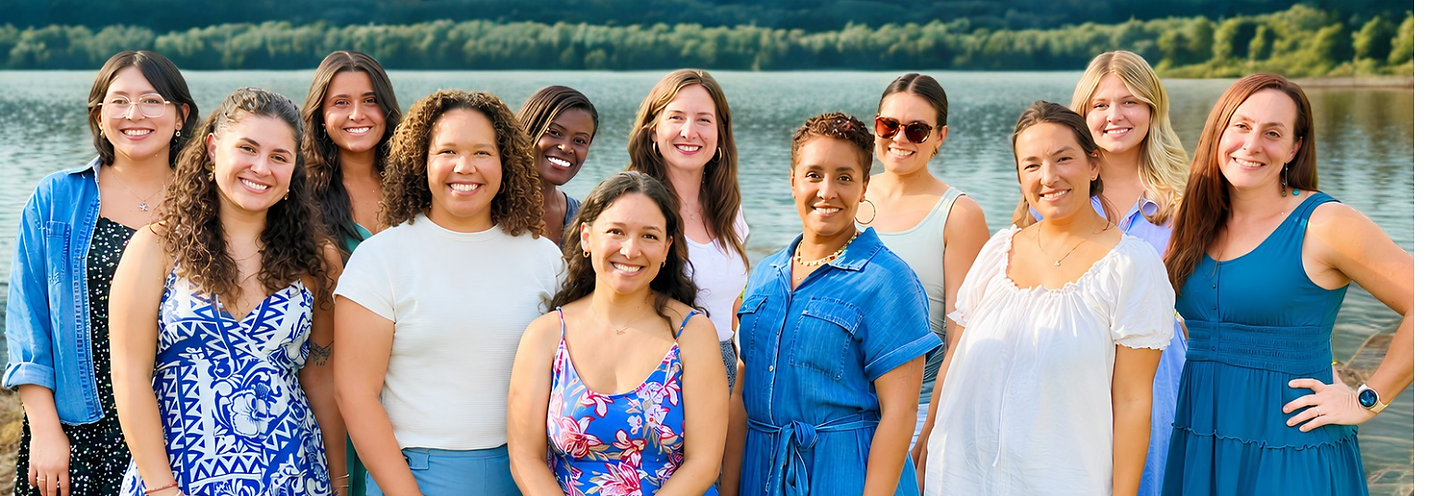 Team photograph of twelve therapists employed by Calm Waters Wellness