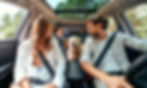 family and dog driving around town on their day off while staying at an airbnb for local staycation