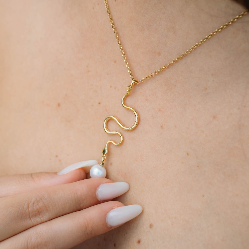 Thumbnail: Collana serpente con perla