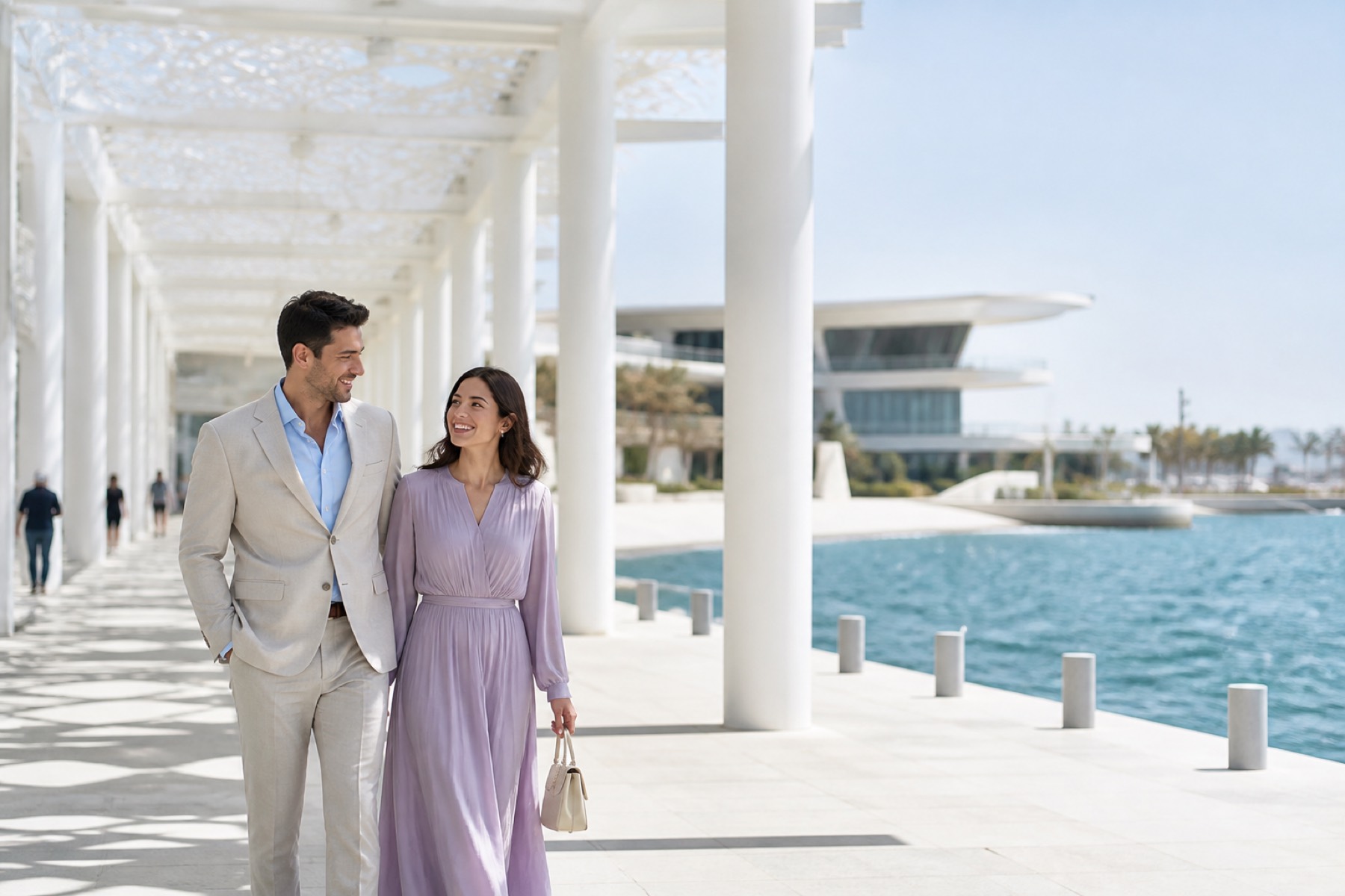 Cool bright Red Sea waterfront in Jeddah with contemporary architecture and a couple arriving by promenade; no décor.