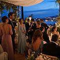 Guests at an evening outdoor wedding reception in the UAE.