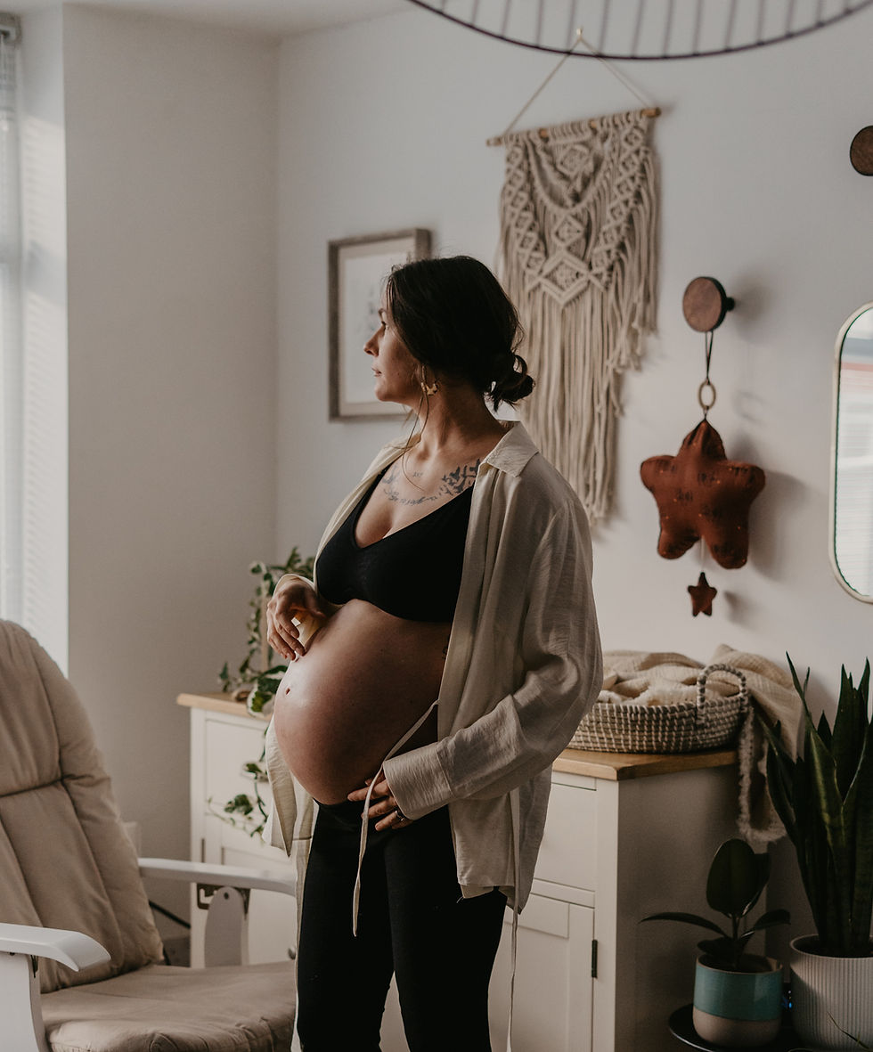 pregnant person in nursery