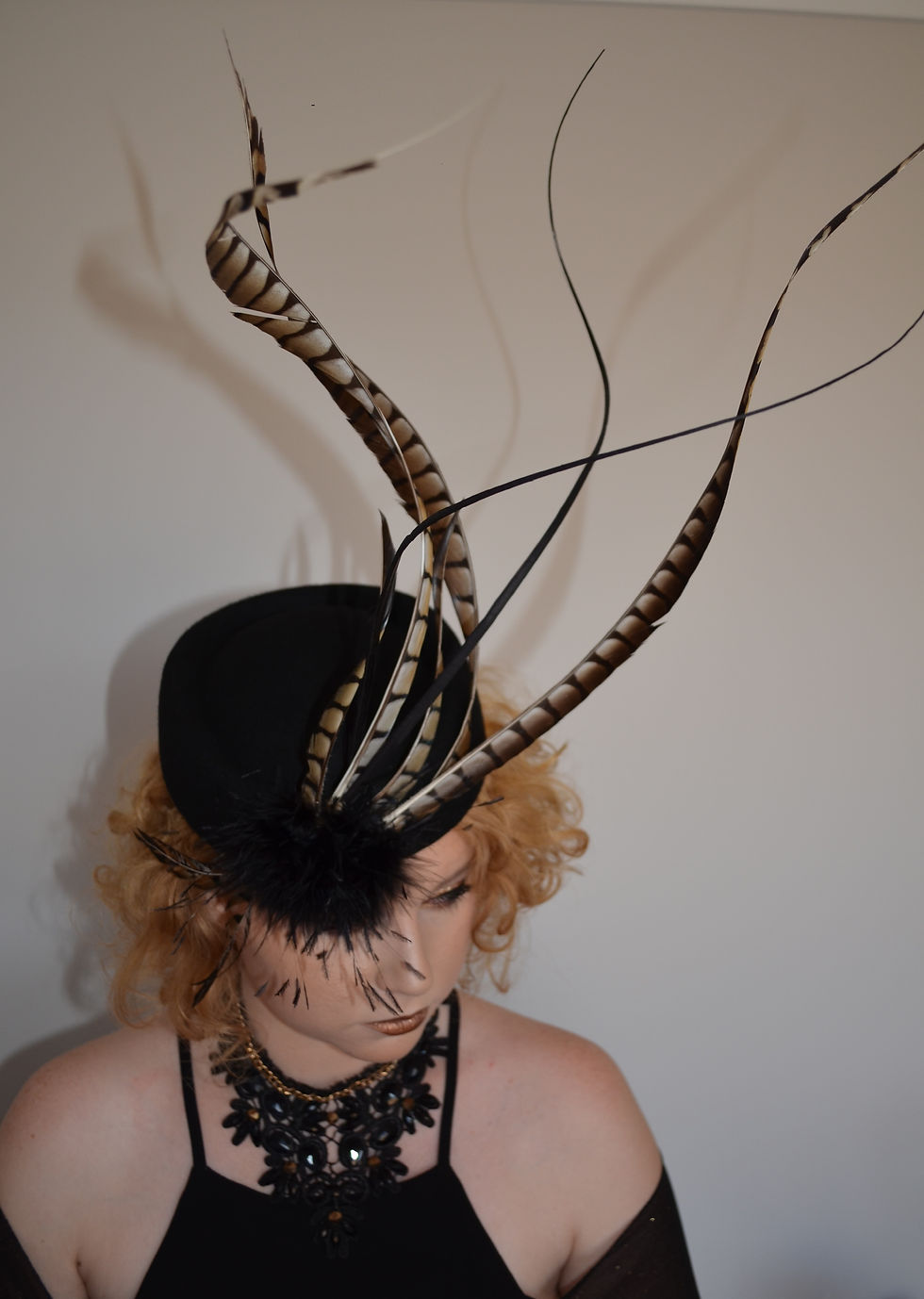 Thumbnail: black felt fascinator with curled phesant and marabou de lew