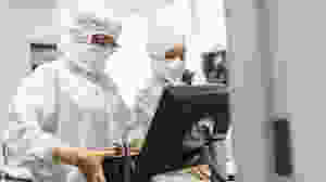 Spark Therapeutics manufacturing associates preparing to purify Luxturna at the company's manufacturing facility in West Philadelphia, Pennsylvania.