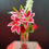 Thumbnail: Scarlet Symphony, delphinium, lilies, and roses
