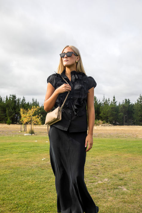 Gifted winter outfit styled outdoors for seasonal apparel photography.