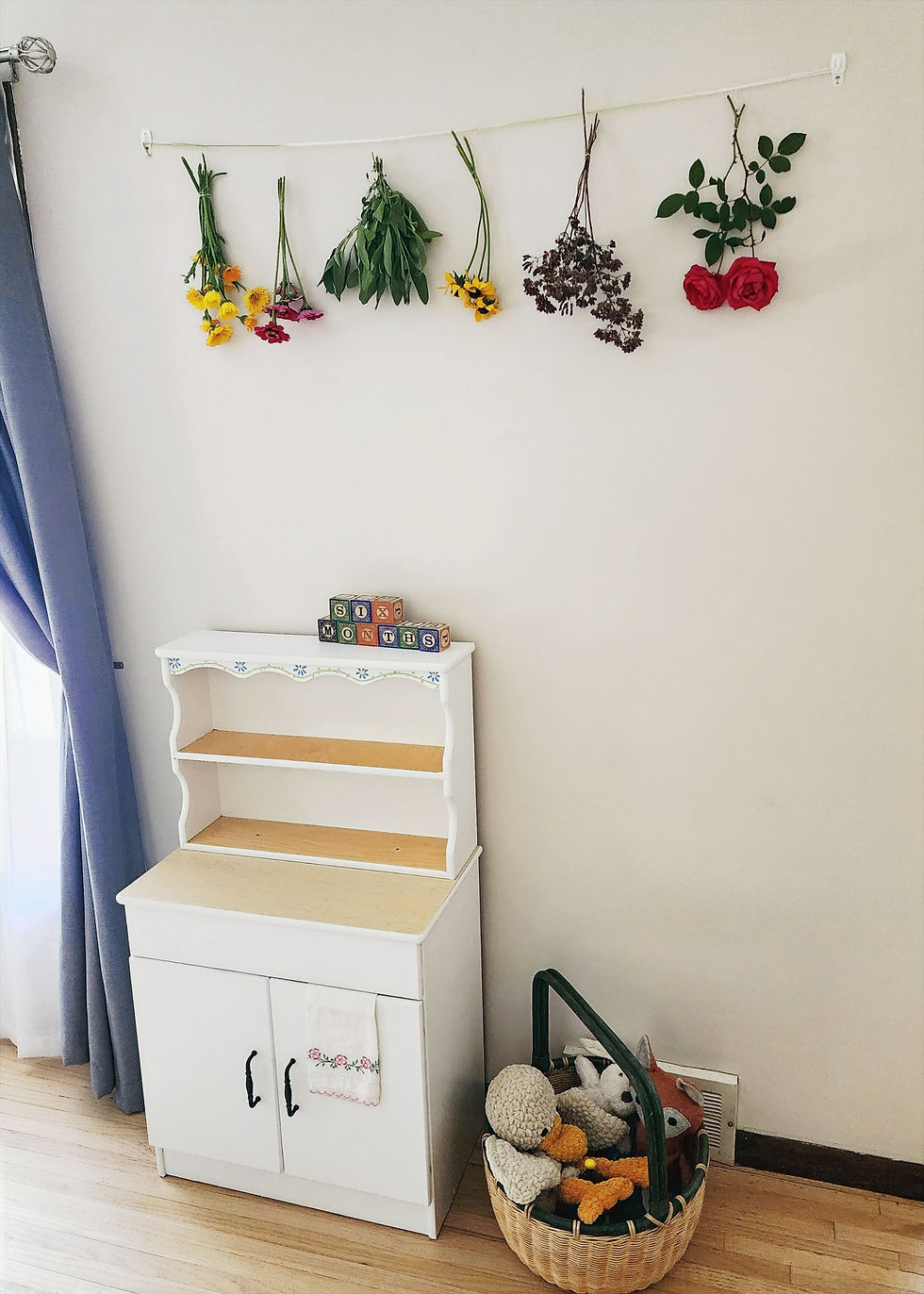 I hung calendula, zinnia, sage, black-eyed susan, purple oregano flowers, and roses