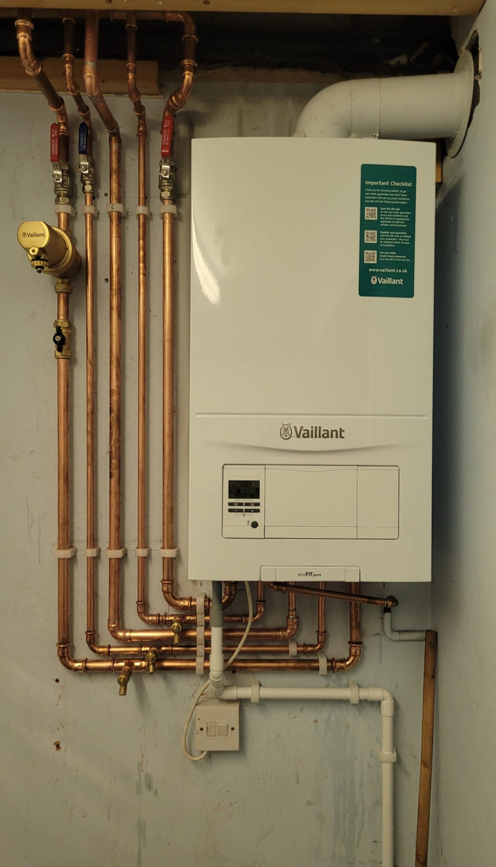 Commercial plumbing installation with neatly fitted copper pipework
