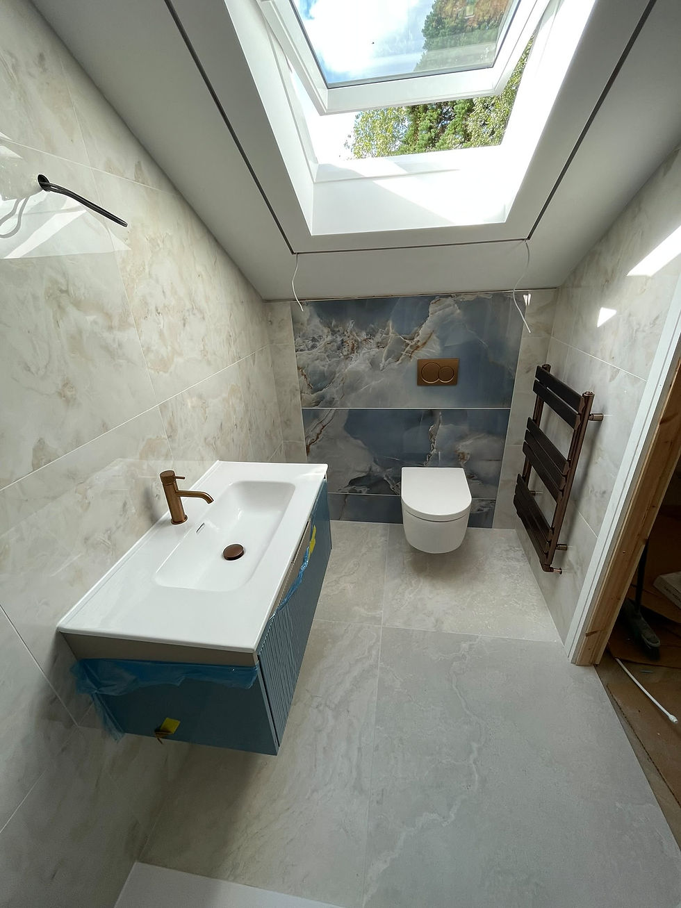 Modern bathroom refit in Saddleworth by MGA Plumbing & Heating