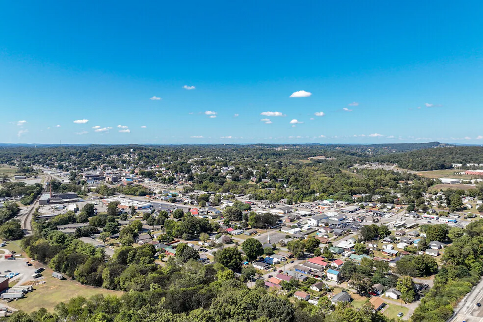 Lenoir City TN neighborhood showing single-family homes and tree-lined streets