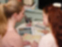 A tutor providing face to face tuition to a GCSE student