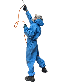 pest controller spraying a house