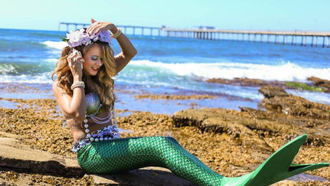 Living Mermaid at a corporate beach event
