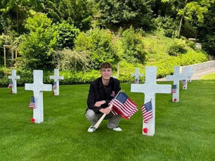 Preston Sharp Placing Flags and Flowers at Veterans' Graves