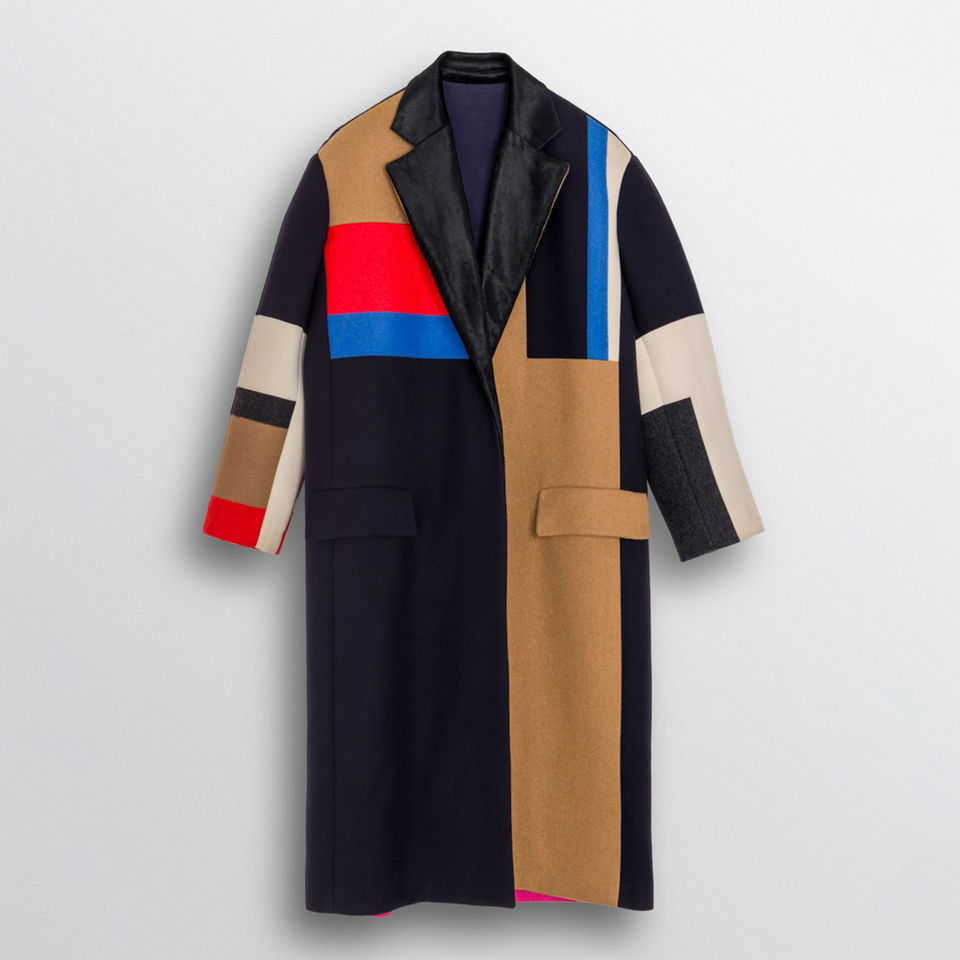 Hanging flat lay photo of a block colored vintage wool coat
