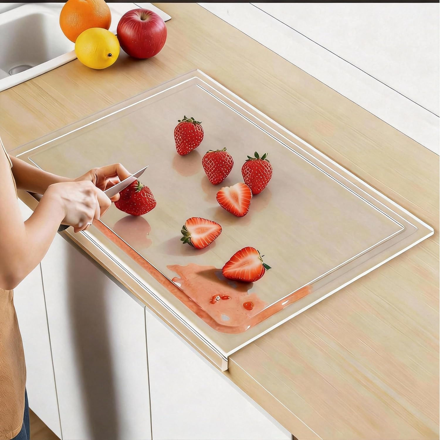 Acrylic cutting board positioned on kitchen counter