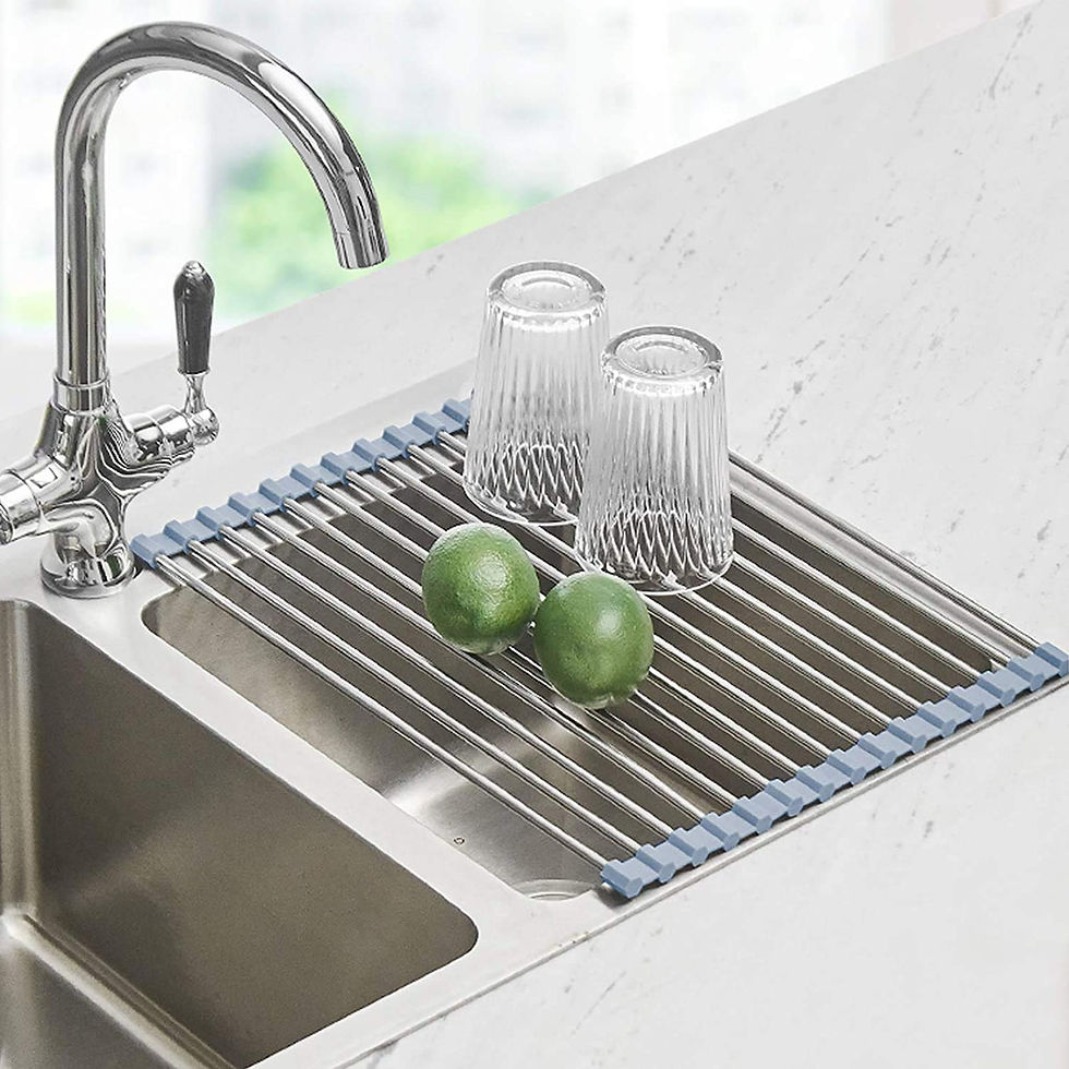Kitchen sink drying rack helping organize dishes and save countertop space
