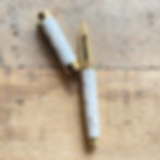 Stylo roller coquilles d’huîtres doré
