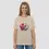 Miniature : T-shirt donuts unisexe. Haut de couleur sable revêtu par une femme mannequin. Un design imprimé sur un coton bio ultra doux.