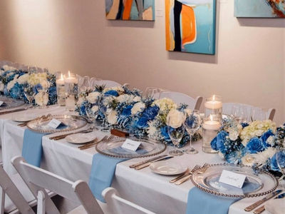 blue & white table setting with chairs.jpg
