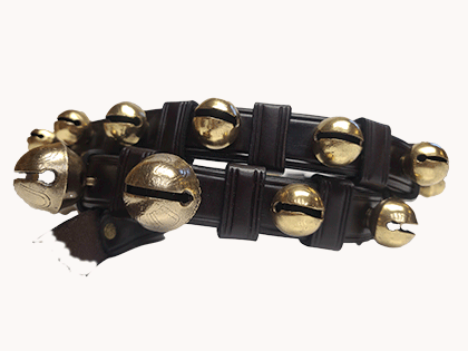 restored/polished brass sleigh bells on new black leather strap