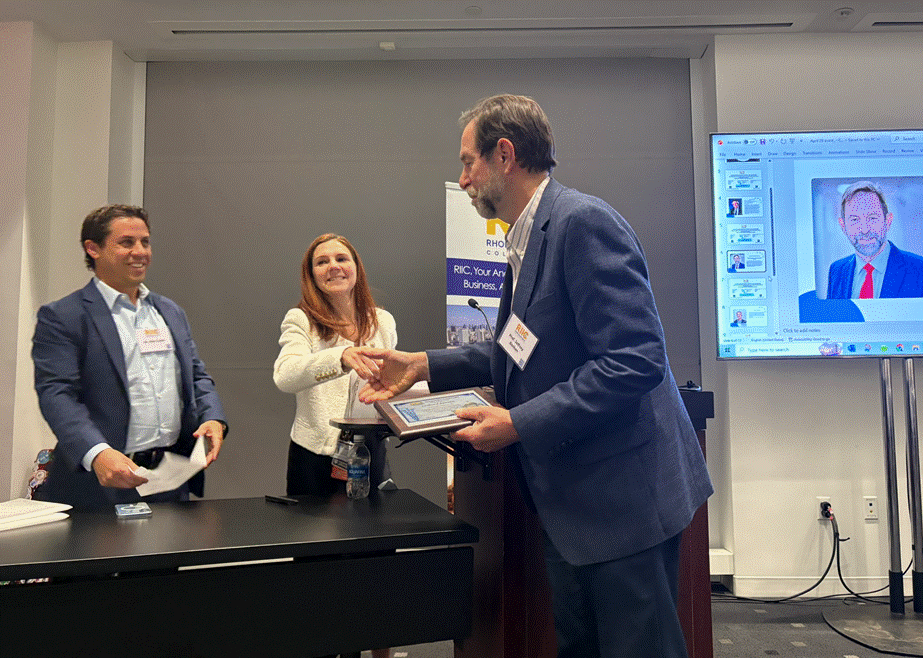 Dr. Alex Cutler and Dr Maytal Sauerbrun Cutler present award to Jeffrey Borkan