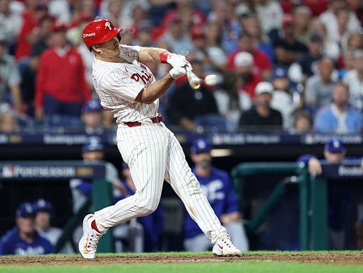 J.T. Realmuto mid swing
