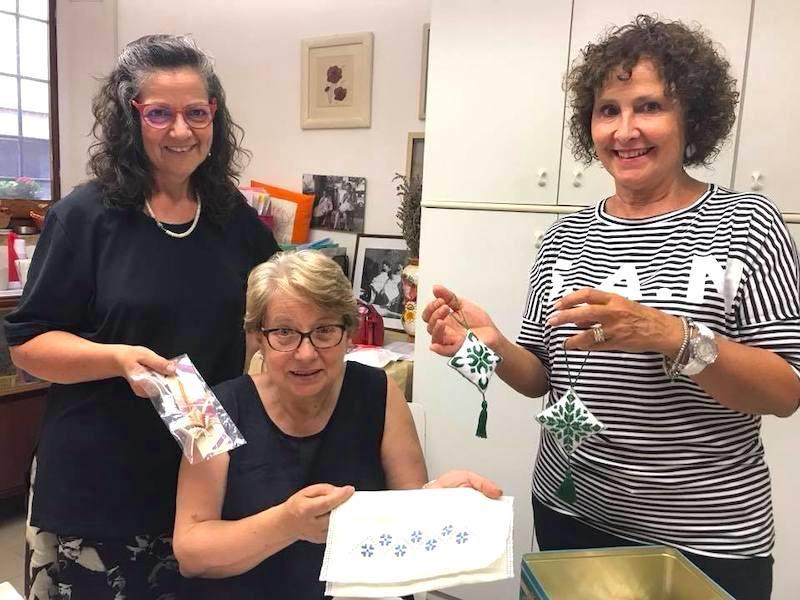 ladies demonstrating women's handmade crafts culture in Mugello, Tuscany