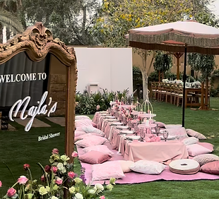 Chic luxury bachelorette party in Ibiza with an elegant pink garden table setup, refined décor and curated details, designed by Alera for stylish pre-wedding celebrations and exclusive private events.
