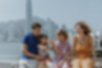 Natural light photo of a Hong Kong family laughing during a relaxed lifestyle session