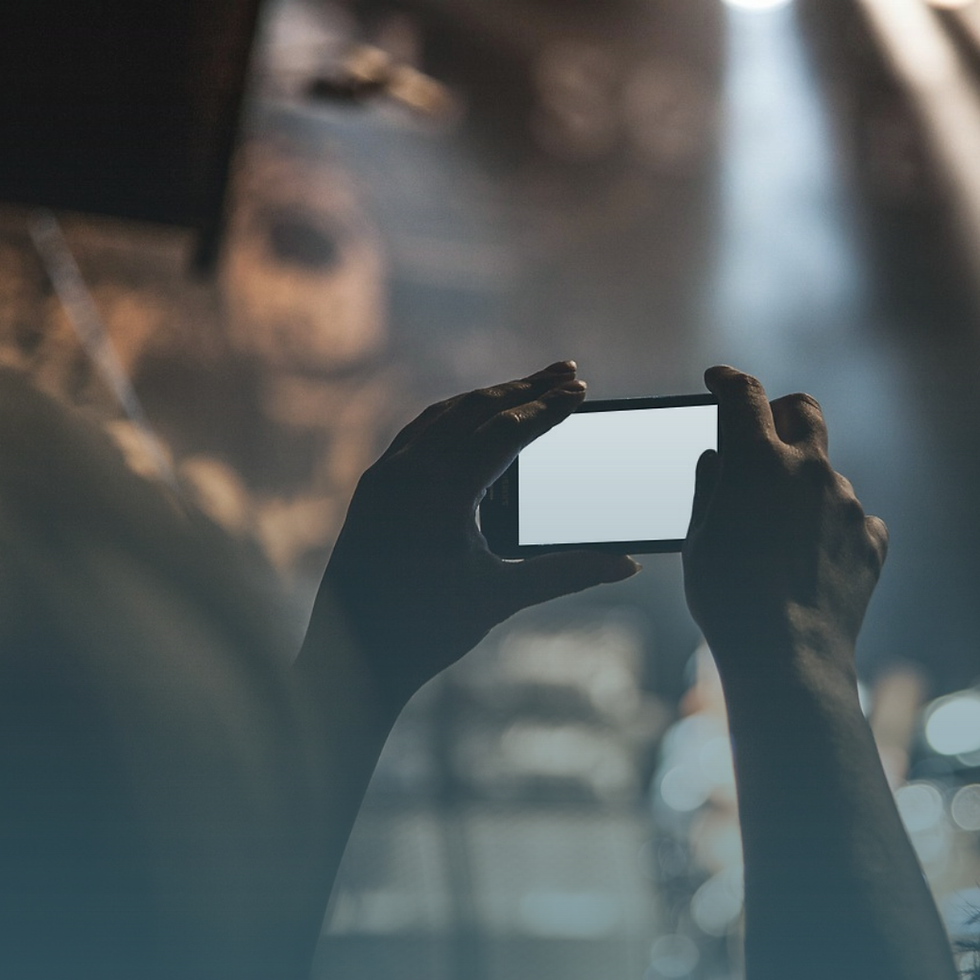 Person holding up a phone