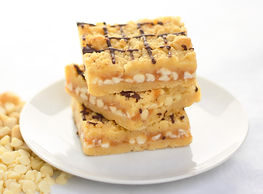 White Chocolate Macadamia Nut Bar, stacked on a plate