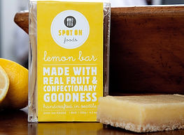 Fresh Lemon Bar next to the retail Spot On Foods container