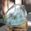 Thumbnail: Clear glass vase on wood base