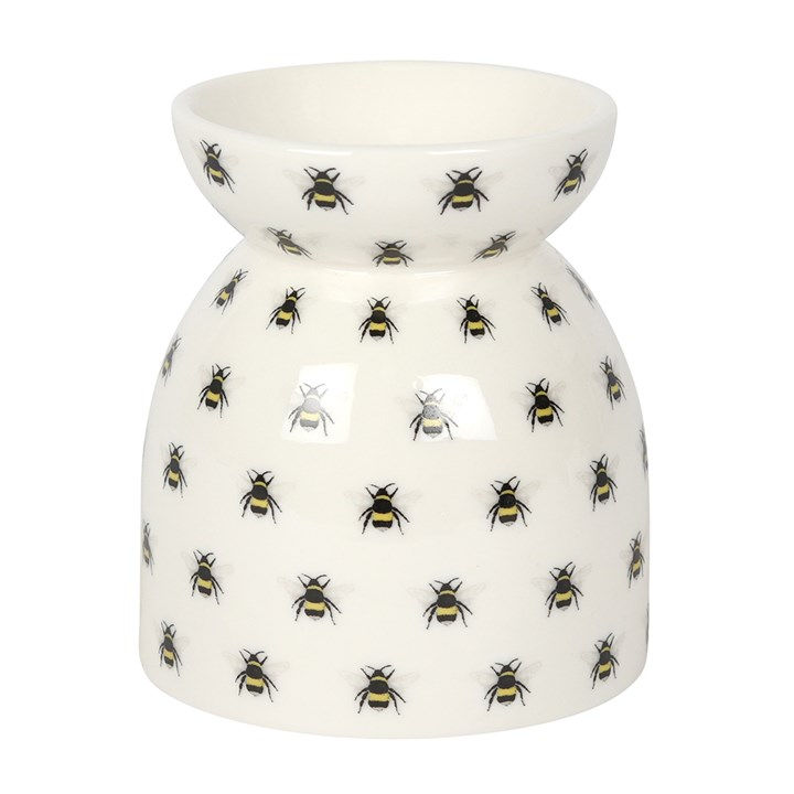 White ceramic egg cup with bee pattern