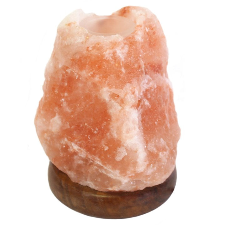 Himalayan pink salt lamp on wooden base