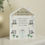 Thumbnail: Personalised Love Makes A Home Wooden House Ornament