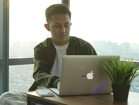 a man working with laptop